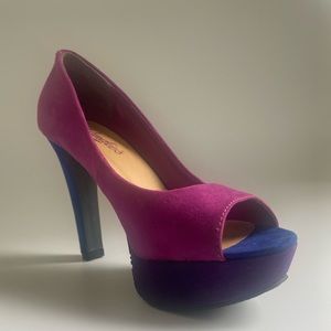 Candies heels. Fuschia and purple. Slight platform. Worn once.